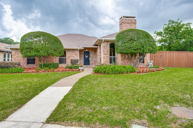 1600 Railhead Pl, Carrollton, TX 75007 - view of front facade with brick siding, roof with shingles, and a chimney