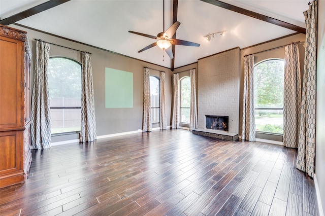 1600 Railhead Pl, Carrollton, TX 75007 - unfurnished living room featuring a ceiling fan, dark wood-style floors, baseboards, a fireplace, and ornamental molding