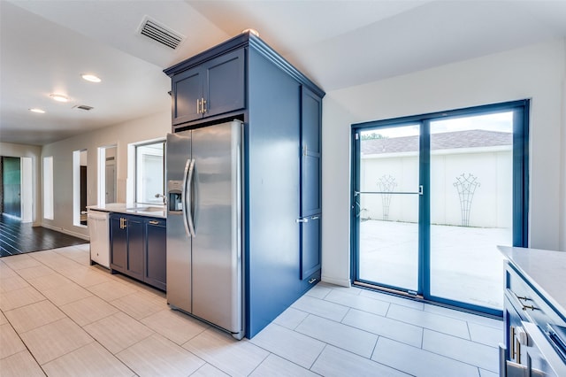 1600 Railhead Pl, Carrollton, TX 75007 - kitchen with stainless steel appliances, light countertops, recessed lighting, a sink, and light tile patterned floors