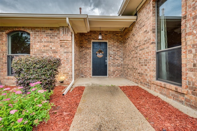 1600 Railhead Pl, Carrollton, TX 75007 - view of exterior entry featuring brick siding