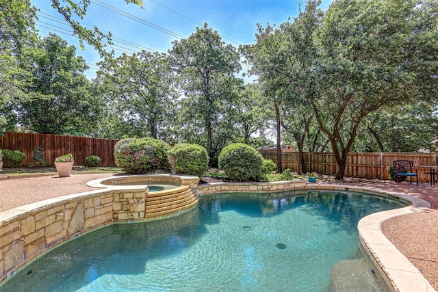 12332 Green Ash Dr, Fort Worth, TX 76244 - view of pool with a fenced backyard, a pool with connected hot tub, and a patio