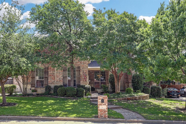 12332 Green Ash Dr, Fort Worth, TX 76244 - view of property hidden behind natural elements with brick siding