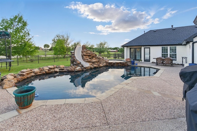 3320 S Fm 548, Royse City, TX 75189 - view of pool featuring a water slide, a patio area, and french doors