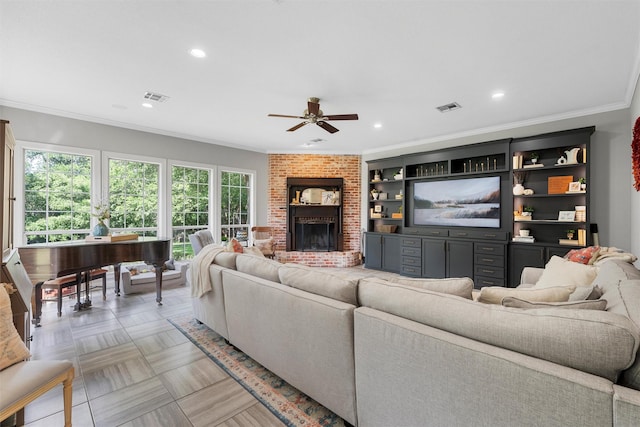 306 Winding Creek Ln, Mcgregor, TX 76657 - living area featuring healthy amount of natural light, a ceiling fan, crown molding, recessed lighting, and a fireplace