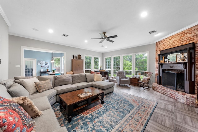 306 Winding Creek Ln, Mcgregor, TX 76657 - living room featuring crown molding, a fireplace, recessed lighting, and ceiling fan