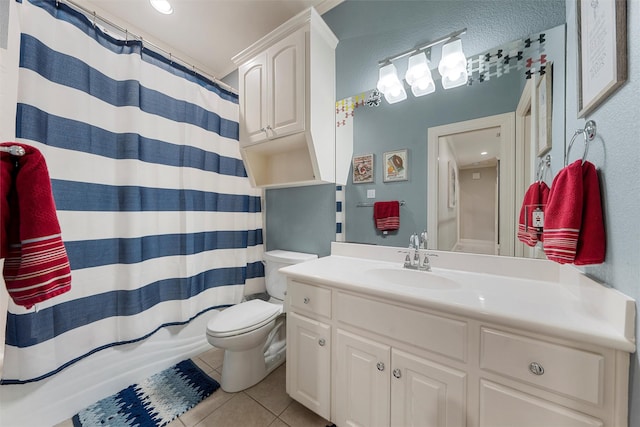 306 Winding Creek Ln, Mcgregor, TX 76657 - full bath featuring tile patterned flooring, toilet, vanity, and curtained shower