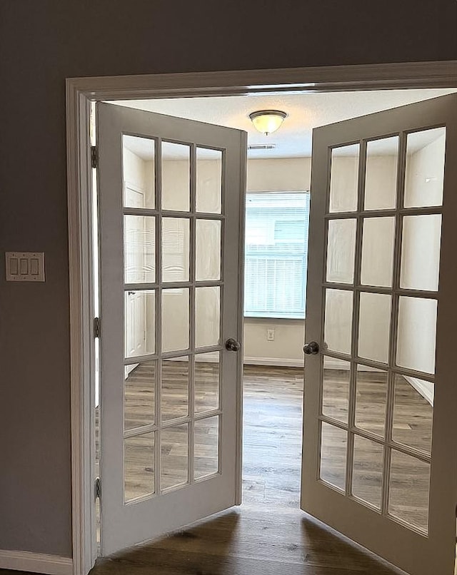 10028 Quail Glen Dr, Fort Worth, TX 76140 - doorway featuring dark wood-style floors