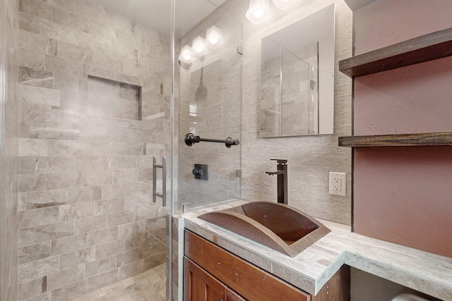 6723 Blessing Dr, Dallas, TX 75214 - bathroom featuring a shower stall and vanity
