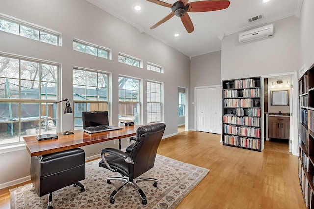 6723 Blessing Dr, Dallas, TX 75214 - office space with a high ceiling, wood finished floors, an AC wall unit, a ceiling fan, and recessed lighting