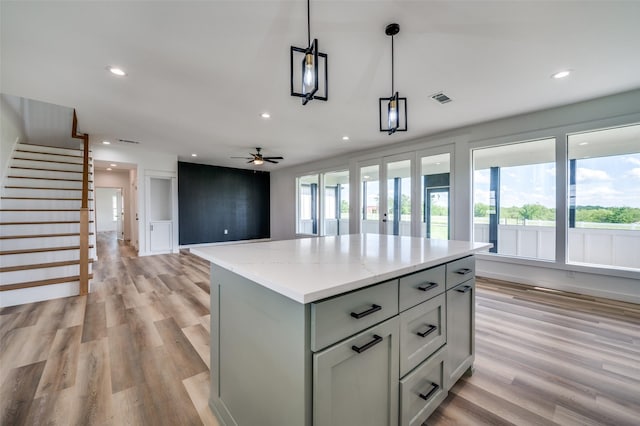 488 Klas Rd, Sherman, TX 75092 - kitchen with healthy amount of natural light, recessed lighting, a center island, and light wood finished floors