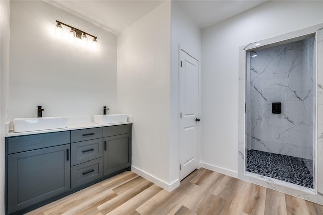 488 Klas Rd, Sherman, TX 75092 - full bath with double vanity, wood finished floors, and a marble finish shower