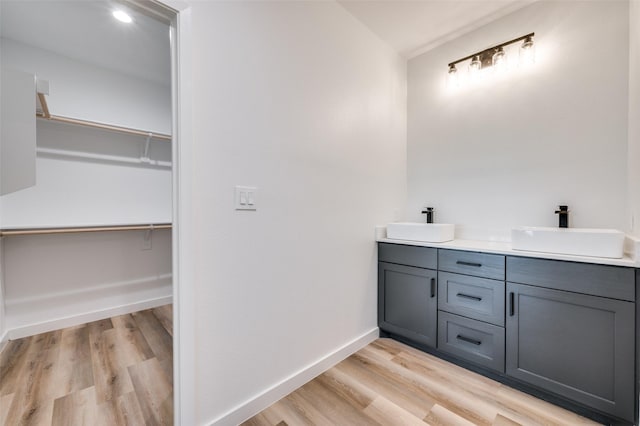 488 Klas Rd, Sherman, TX 75092 - full bath featuring double vanity, wood finished floors, and a spacious closet
