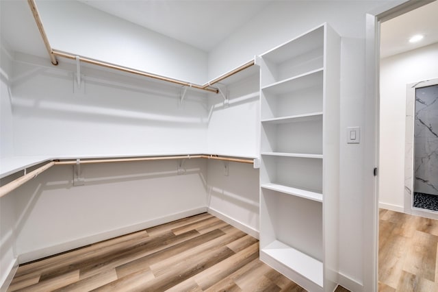 488 Klas Rd, Sherman, TX 75092 - walk in closet with wood finished floors