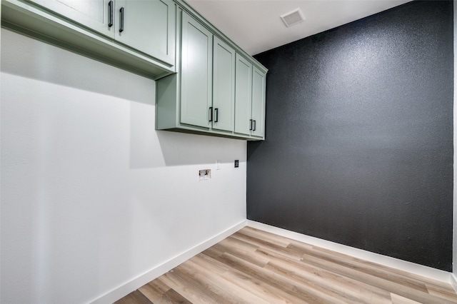 488 Klas Rd, Sherman, TX 75092 - laundry area with cabinet space, washer hookup, and light wood-type flooring