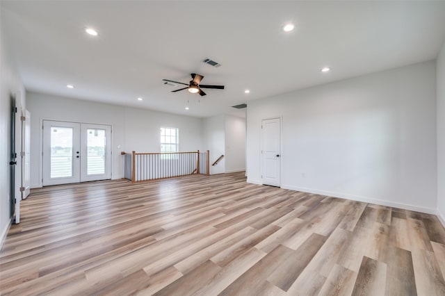488 Klas Rd, Sherman, TX 75092 - empty room with recessed lighting, light wood finished floors, ceiling fan, and french doors