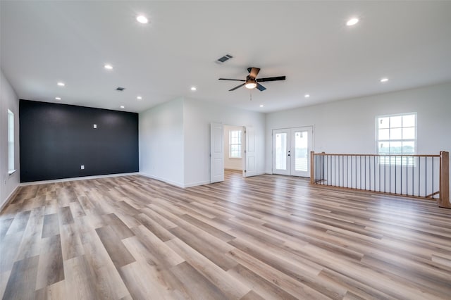 488 Klas Rd, Sherman, TX 75092 - unfurnished living room featuring ceiling fan, recessed lighting, light wood finished floors, and french doors
