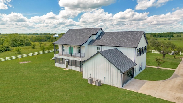 488 Klas Rd, Sherman, TX 75092 - view of property exterior featuring a shingled roof, a balcony, a garage, driveway, and a rural view