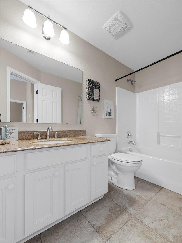 2135 Highland Dr, Wylie, TX 75098 - bathroom with toilet, vanity, shower / tub combination, and tile patterned flooring