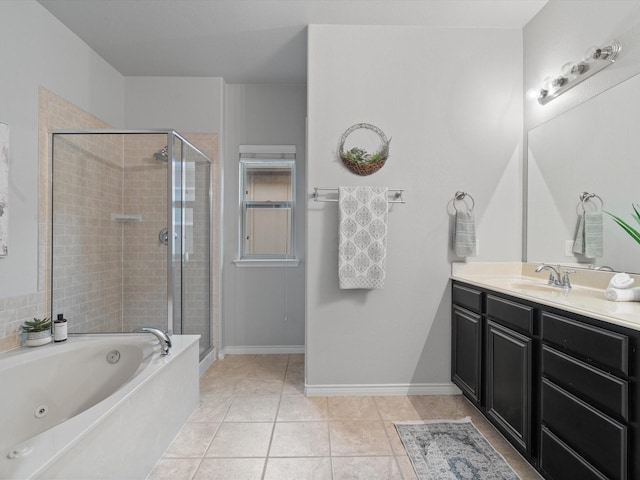 8821 Whitehead St, Mckinney, TX 75070 - bathroom with a stall shower, vanity, a whirlpool tub, and tile patterned flooring