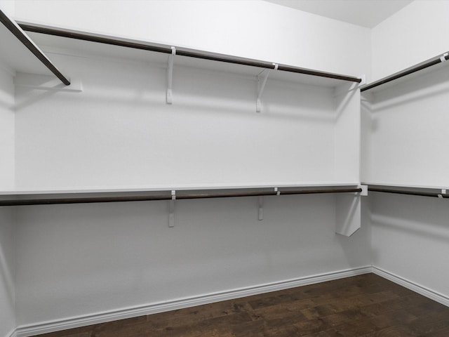 8821 Whitehead St, Mckinney, TX 75070 - spacious closet featuring dark wood finished floors