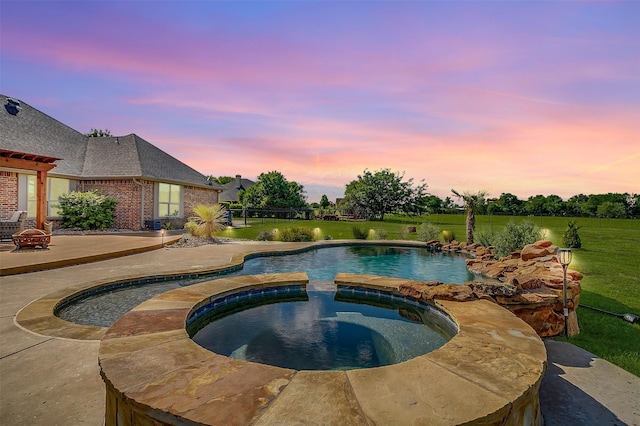 122 King Ranch Ct, Fort Worth, TX 76108 - view of pool featuring a fire pit, a lawn, and a pool with connected hot tub
