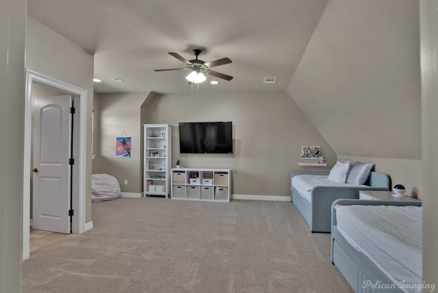 bedroom featuring light carpet, baseboards, vaulted ceiling, and a ceiling fan