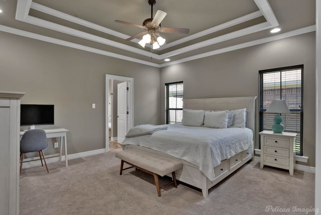 bedroom with a tray ceiling, multiple windows, recessed lighting, light colored carpet, and crown molding