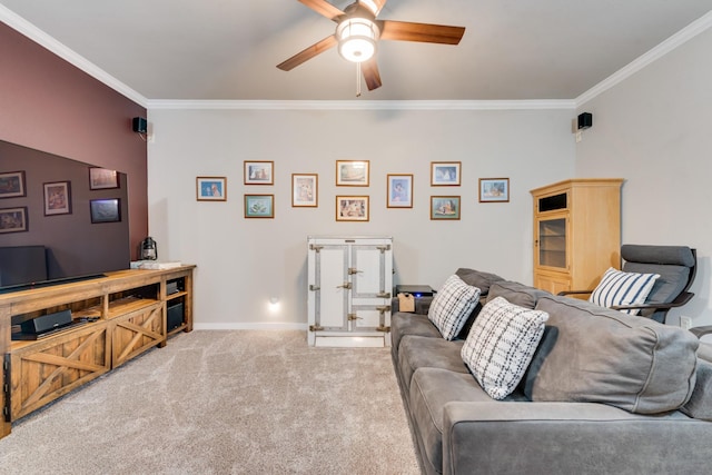 living room featuring crown molding, ceiling fan, light carpet, and baseboards