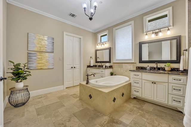 bathroom featuring crown molding, a chandelier, a bath, stone finish floors, and baseboards