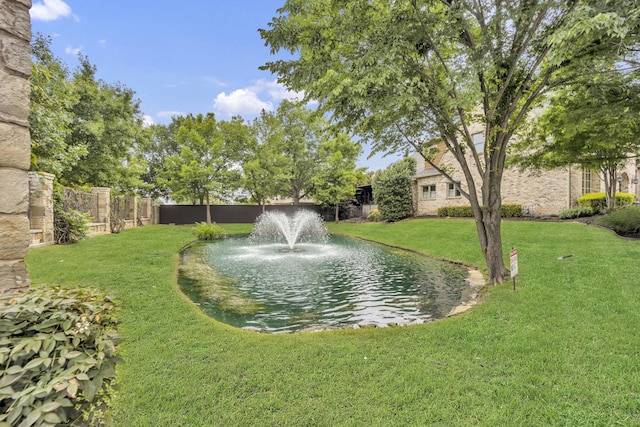 water view featuring fence