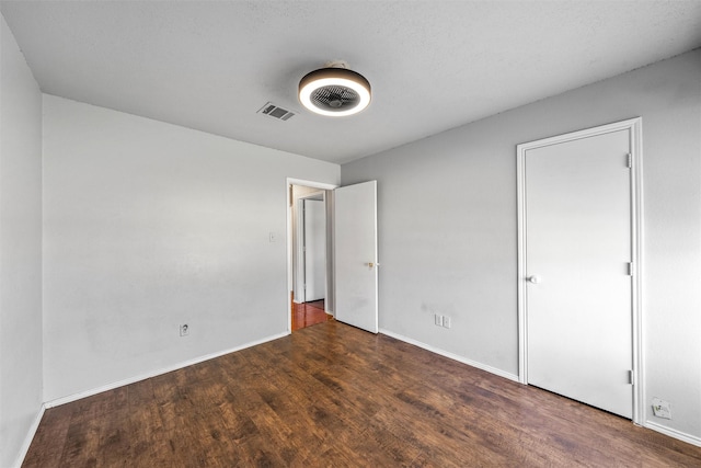 4627 Lexington St, Bellmead, TX 76705 - unfurnished bedroom featuring wood finished floors and baseboards