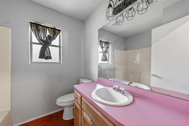 4627 Lexington St, Bellmead, TX 76705 - bathroom with toilet, vanity, baseboards, and a shower
