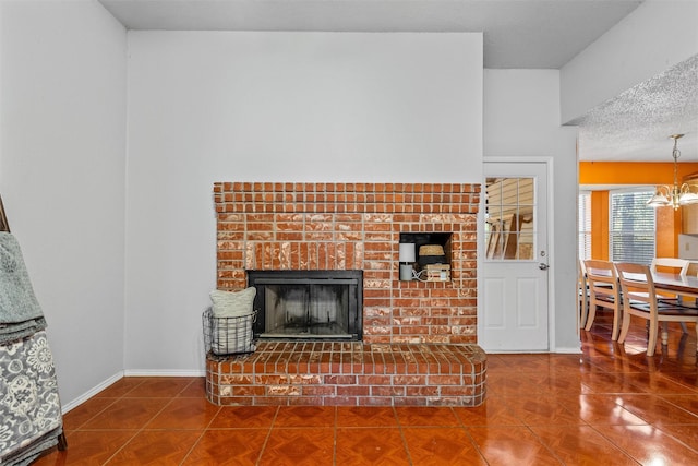 4627 Lexington St, Bellmead, TX 76705 - living area featuring a brick fireplace, baseboards, and a chandelier