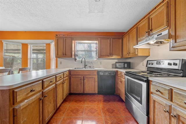 4627 Lexington St, Bellmead, TX 76705 - kitchen featuring dishwasher, electric stove, under cabinet range hood, a sink, and a peninsula