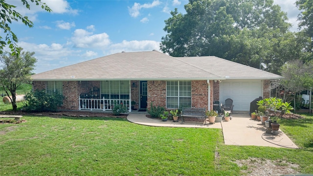 12097 Kyle Ln, Blue Ridge, TX 75424 - ranch-style house featuring an attached garage, a front yard, brick siding, and concrete driveway