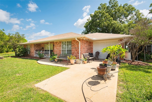 12097 Kyle Ln, Blue Ridge, TX 75424 - rear view of property with an attached garage, concrete driveway, brick siding, a yard, and a shingled roof
