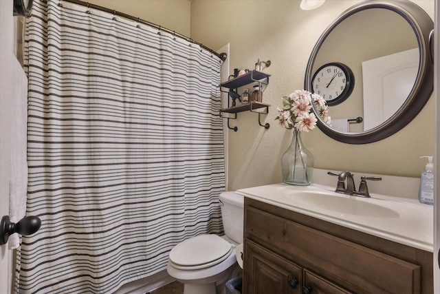 4213 Autumn Path Rd, Denton, TX 76208 - bathroom featuring vanity, toilet, a textured wall, and curtained shower