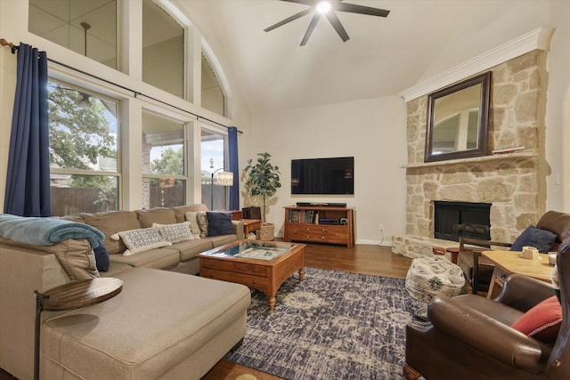 4213 Autumn Path Rd, Denton, TX 76208 - living room with a ceiling fan, healthy amount of natural light, high vaulted ceiling, a fireplace, and wood finished floors