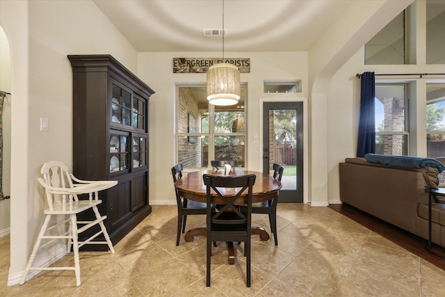 4213 Autumn Path Rd, Denton, TX 76208 - dining room with arched walkways and baseboards