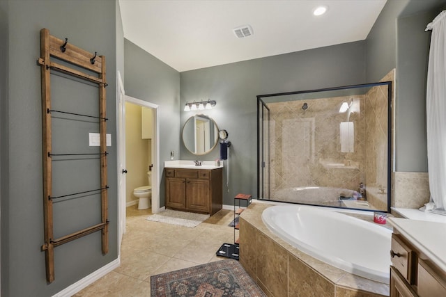 4213 Autumn Path Rd, Denton, TX 76208 - bathroom with a garden tub, toilet, vanity, tiled shower, and tile patterned floors