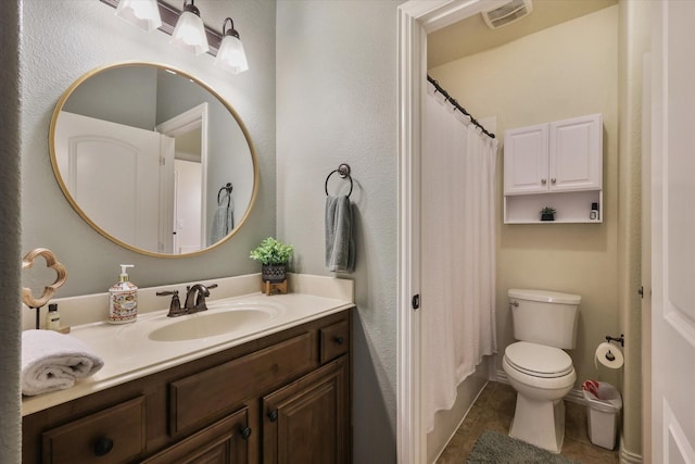 4213 Autumn Path Rd, Denton, TX 76208 - bathroom featuring toilet, vanity, curtained shower, and a textured wall
