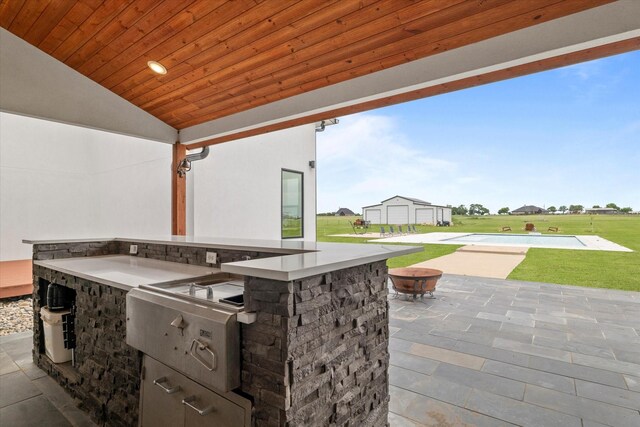 1595 Bledsoe Rd, Gunter, TX 75058 - view of patio / terrace featuring an outdoor kitchen and a fire pit