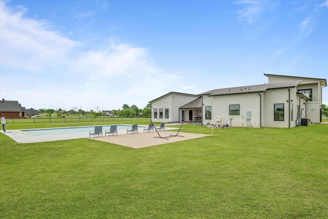 1595 Bledsoe Rd, Gunter, TX 75058 - rear view of house with stucco siding, a patio area, a standing seam roof, metal roof, and cooling unit