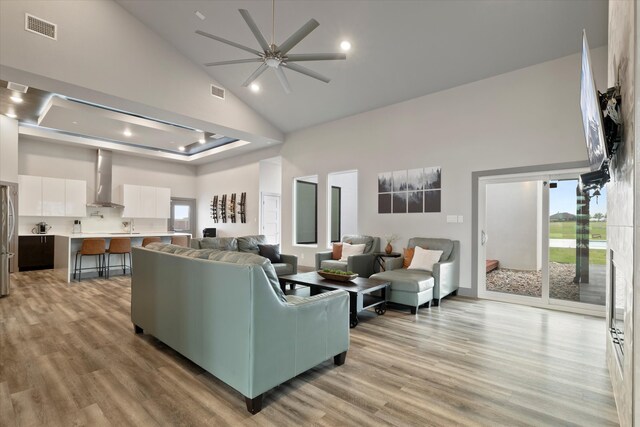 1595 Bledsoe Rd, Gunter, TX 75058 - living area with high vaulted ceiling, light wood-type flooring, ceiling fan, and recessed lighting