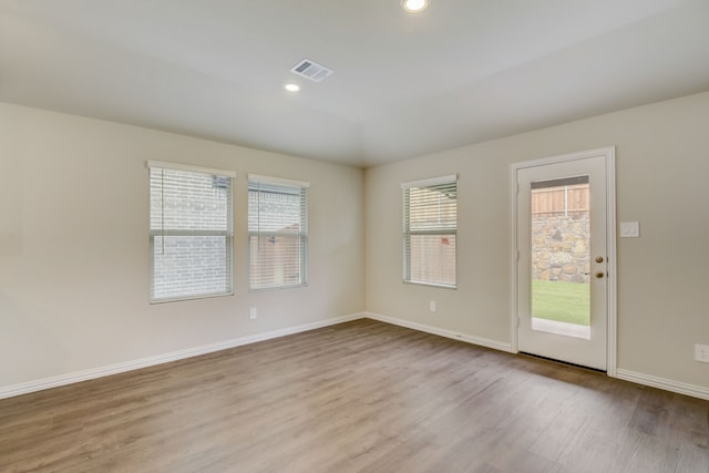 506 Stagg St, Mckinney, TX 75069 - empty room with wood finished floors, baseboards, and recessed lighting