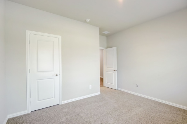 506 Stagg St, Mckinney, TX 75069 - unfurnished bedroom featuring light carpet and baseboards