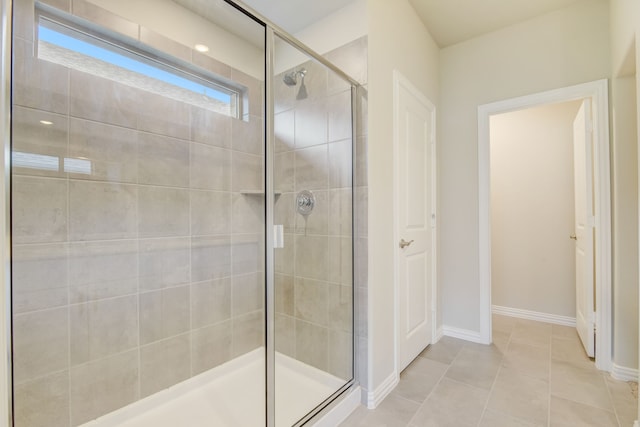 506 Stagg St, Mckinney, TX 75069 - bathroom with a stall shower, baseboards, and tile patterned floors