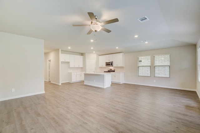 506 Stagg St, Mckinney, TX 75069 - unfurnished living room featuring light wood finished floors, ceiling fan, recessed lighting, and baseboards