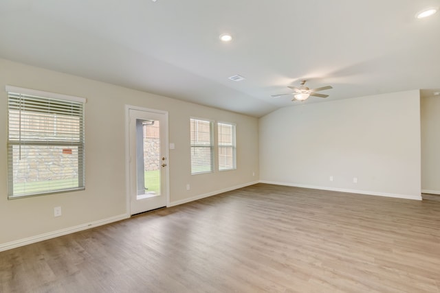 506 Stagg St, Mckinney, TX 75069 - unfurnished room featuring ceiling fan, light wood-type flooring, baseboards, recessed lighting, and vaulted ceiling