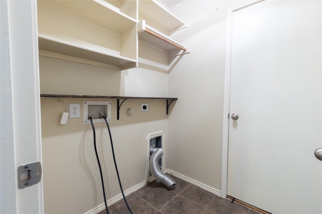 4356 Mountain Crest Dr, Fort Worth, TX 76123 - washroom featuring electric dryer hookup, washer hookup, baseboards, dark tile patterned floors, and hookup for a gas dryer